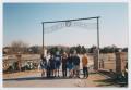 Photograph: [Photograph of TAMS students next to "Circle Ranch" entrance]
