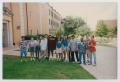 Thumbnail image of item number 1 in: '[Photograph of TAMS students near biology sign]'.