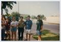 Thumbnail image of item number 1 in: '[Photograph of TAMS students on sidewalk]'.