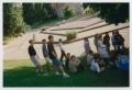 Thumbnail image of item number 1 in: '[Photograph of TAMS students on edge of field]'.