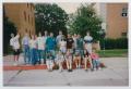 Photograph: [Photograph of TAMS students posing on sidewalk]