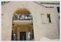 Photograph: [Photograph of TAMS group posing near building stairs]