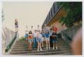 Photograph: [Photograph of TAMS students posing on a staircase]