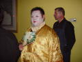Photograph: [Halloween guest dressed in golden robe]