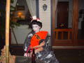Photograph: [Party attendee in geisha costume]