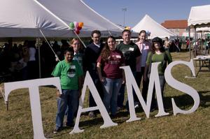 Primary view of object titled '[Group of TAMS alumni at 2008 UNT Homecoming]'.