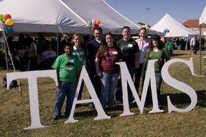 Primary view of object titled '[Group of TAMS alumni at the 2008 UNT Homecoming]'.