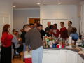 Primary view of [Guests in kitchen at Mike and Tong's party]
