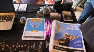 Primary view of object titled '[Handouts at DCCCD booth]'.