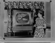 Photograph: [Marie Stevenson featuring a television]
