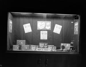 Primary view of object titled '[Lobby window featuring El Producto]'.