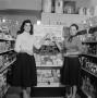 Photograph: [Displaying product at a Beaumont food store]