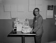 Photograph: [Gene Reynolds with his birthday cake]