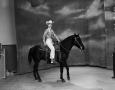 Photograph: [Linda Loftis on horseback]