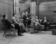 Photograph: [Five men seated on set]