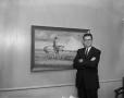 Photograph: [Man Standing Next to a Painting]