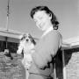 Photograph: [Woman with a puppy]