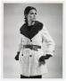 Photograph: [Photograph of a model dressed in a coat]