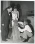 Photograph: [Photograph of Jacques Fath and Stanley Marcus with model]