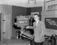 Photograph: [Photograph of Dick Stiller with T.V. camera]