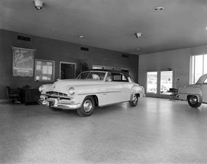 Primary view of object titled '[1952 Dodge Coronet at Ryan Motor Co.]'.
