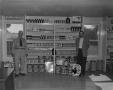 Photograph: [LeGear and Taylor with product display]