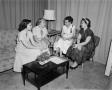 Photograph: [Ann Alden speaking with a group of women]