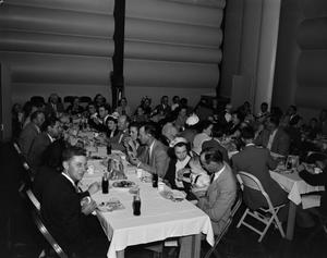 Primary view of object titled '[Guests at a banquet]'.