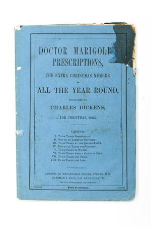 A blue worn pamphlet is seen, with black letters. The title is in big letters, and the front of the page also lists the contents. Everything is framed by black thin lines.