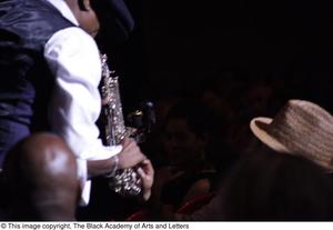 Primary view of object titled '[Six Brothers on Sax Concert Photograph UNTA_AR0797-174-027-2400]'.
