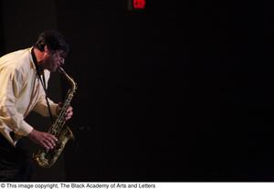 Primary view of object titled '[Six Brothers on Sax Concert Photograph UNTA_AR0797-174-027-2590]'.