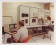 Thumbnail image of item number 1 in: '[Photograph of workers at the Avionics Hot Bench]'.