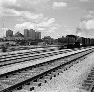 Primary view of object titled '[Photograph of a train in Fort Worth]'.