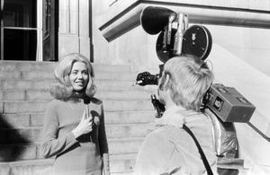 Primary view of object titled '[Sharon Noble giving a news report]'.