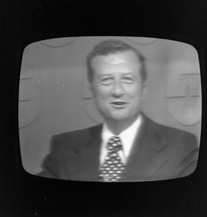 Primary view of object titled '[Harold Taft on a television screen]'.