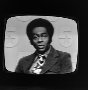 Primary view of object titled '[Mark Gibson on television]'.