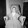Photograph: [Photograph of Carol Williams sitting in a chair in a costume, 2]