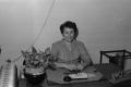 Photograph: [Photograph of a phone operator at her desk]