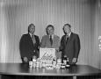 Photograph: [Men with food products]