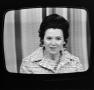 Photograph: [Bobbie Wygant on a television screen]