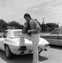 Photograph: [Don Shores with an automobile]