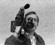 Photograph: [Photograph of David Young posing with a camera, 2]