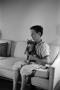 Primary view of [Photograph of Byrd Williams IV with a cat, 2]