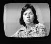 Photograph: [A woman on News at 8]
