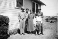Primary view of [Photograph of Byrd Jr, John, Irene, Charles, and another man in front of a house]