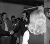 Photograph: [Photograph of individuals gathered at an event]
