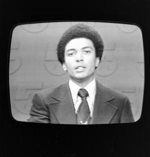 Primary view of object titled '[Willie Monroe on television]'.