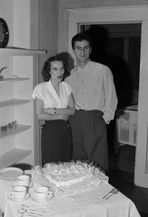 Primary view of object titled '[Photograph of a couple with a cake]'.