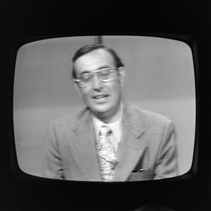 Primary view of object titled '[News broadcast on television]'.