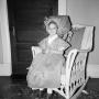 Photograph: [Photograph of Carol Williams sitting in a chair in a costume]